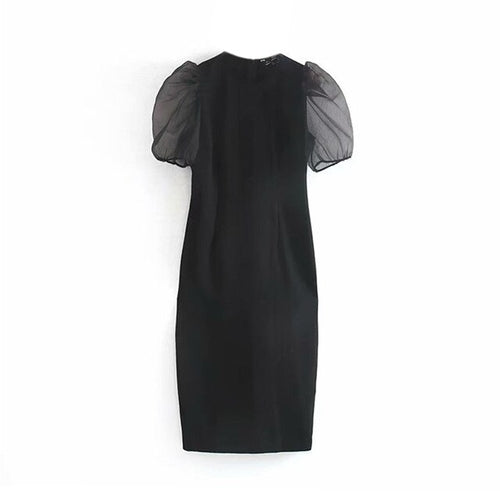 Elegante vestido midi negro con mangas abullonadas de patchwork